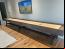 Custom leather wrapped exterior and interior walls of cradle in Distress Leather, Cradle Stain in Rich Walnut with Oil Rubbed Bronze Legs